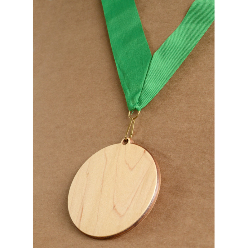 large wooden medal with neck ribbon