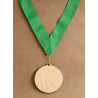 big medal with green neck ribbon