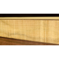 closeup of top with curly maple between thin layers of walnut and maple
