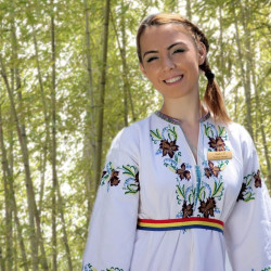 Female in bamboo forest with bamboo name tag
