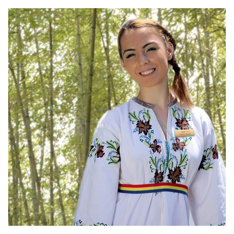 Female in bamboo forest with bamboo name tag
